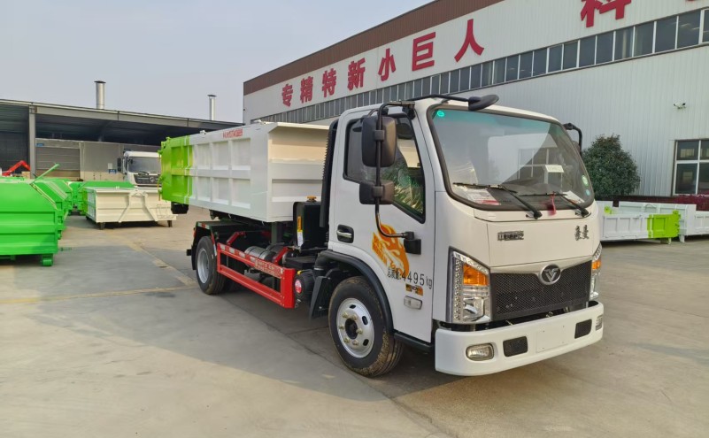 重汽豪曼藍(lán)牌勾臂垃圾車(chē)